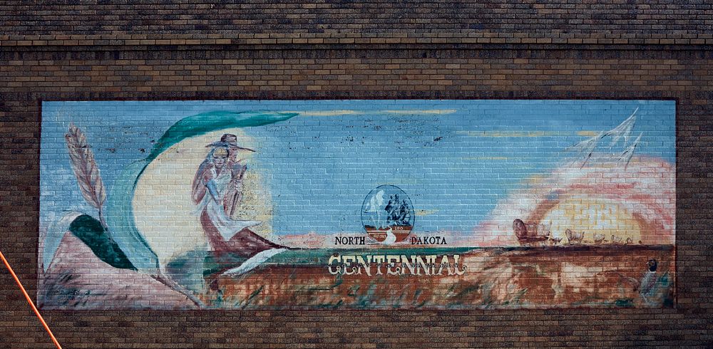                         Mural about North Dakota history in Ellendale, a small town near the South Dakota border in the…