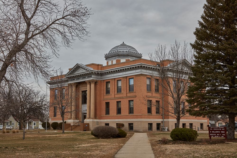                         The buff brick McHenry County Courthouse, which opened in 1907 in Towner, North Dakota              …