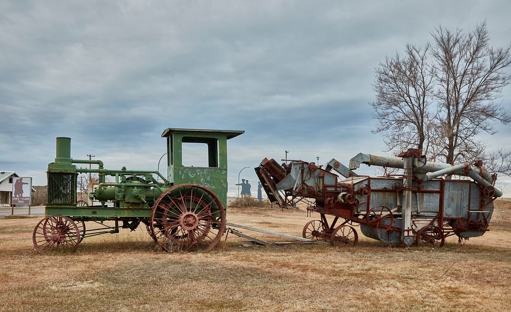                         Vintage farm equipment displayed outside the Lewis & Clark Trail Museum in Alexander, North Dakota  …