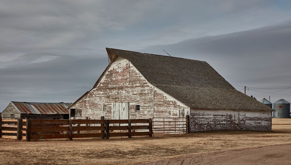                         A substantial, but weathered, barn near Roscoe, Nebraska                        