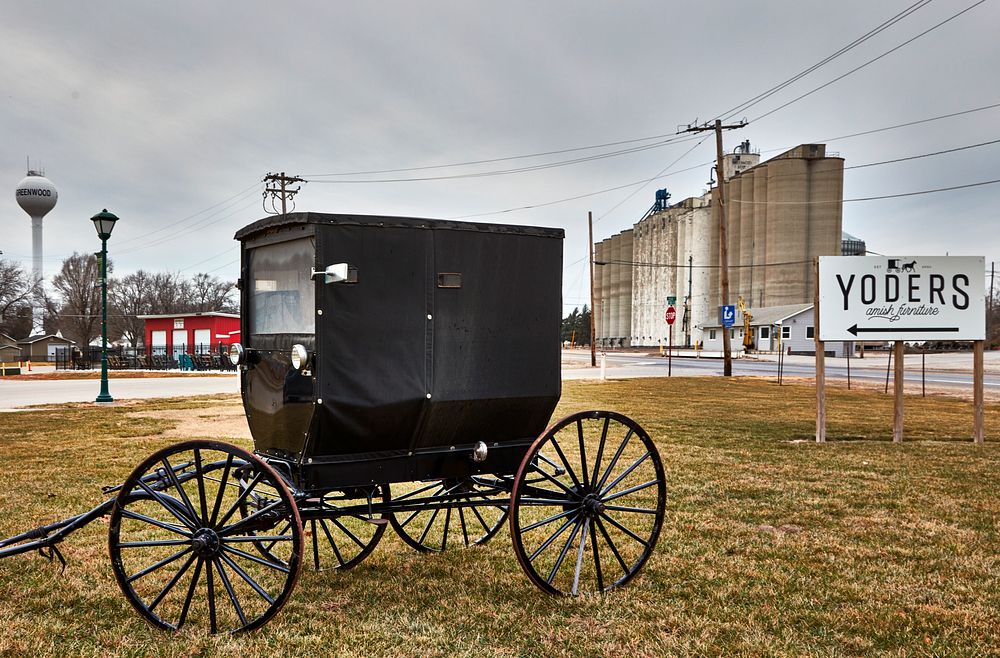                         An Amish buggy, used to interest passersby in little Greenwood, Nebraska, in the nearby Yoder…