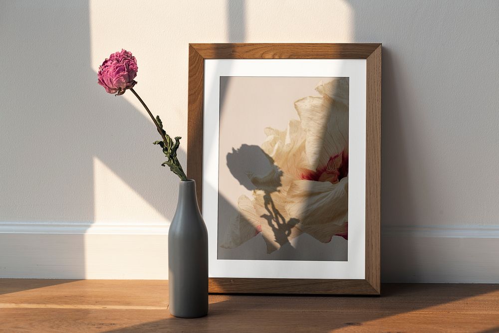 Photo frame mockup, flower vase decor psd