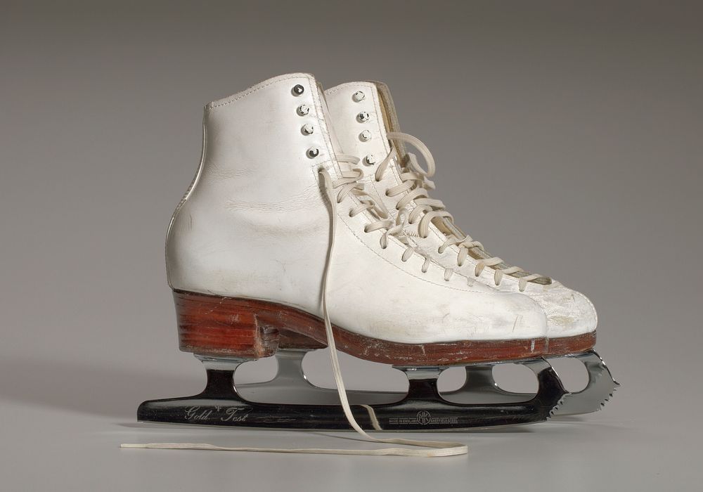 Pair of white figure skates worn by Debi Thomas
