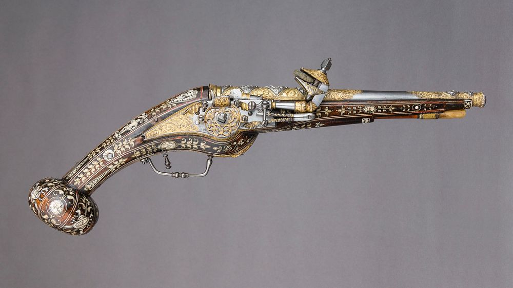Pair of Wheellock Pistols, decoration on the stocks copied in part from engravings by Etienne Delaune