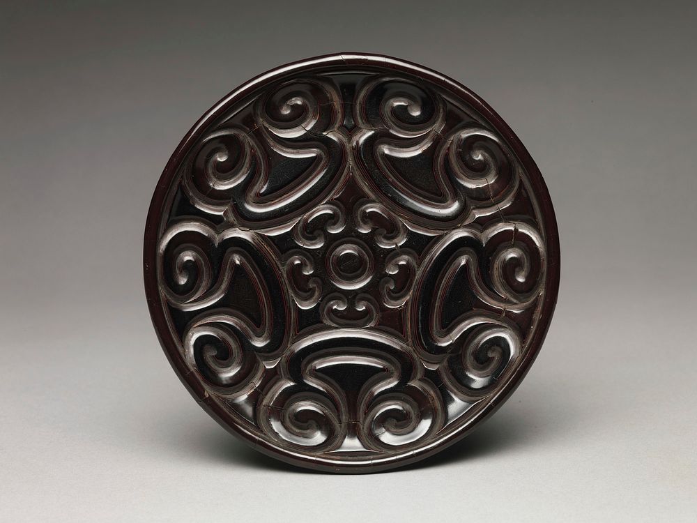 Dish with pommel scrolls