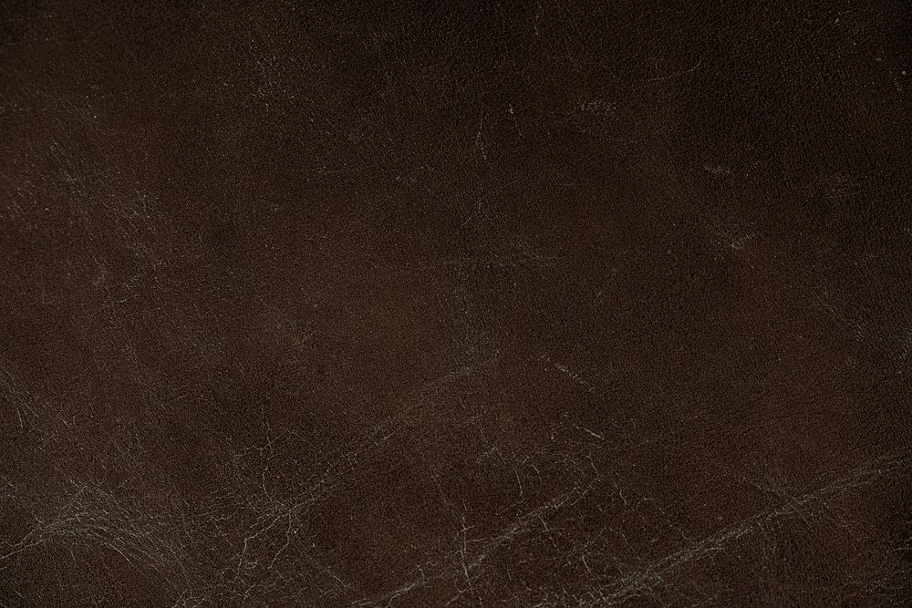 Dark brown leather texture background