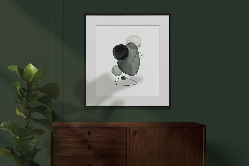 Abstract paint in a picture frame mockup on the dark green wall