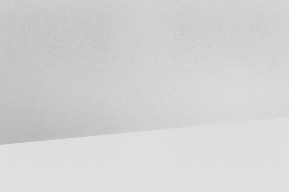 Light grey background, empty product backdrop
