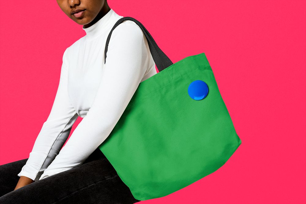 Woman using green tote bag, eco product