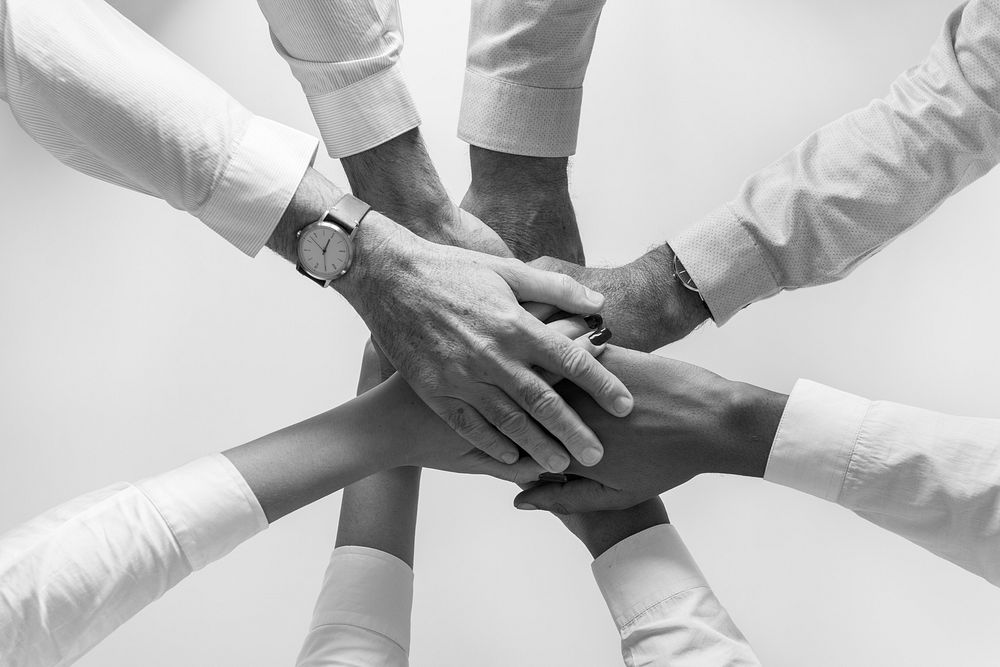 Business teamwork, hands joined together 