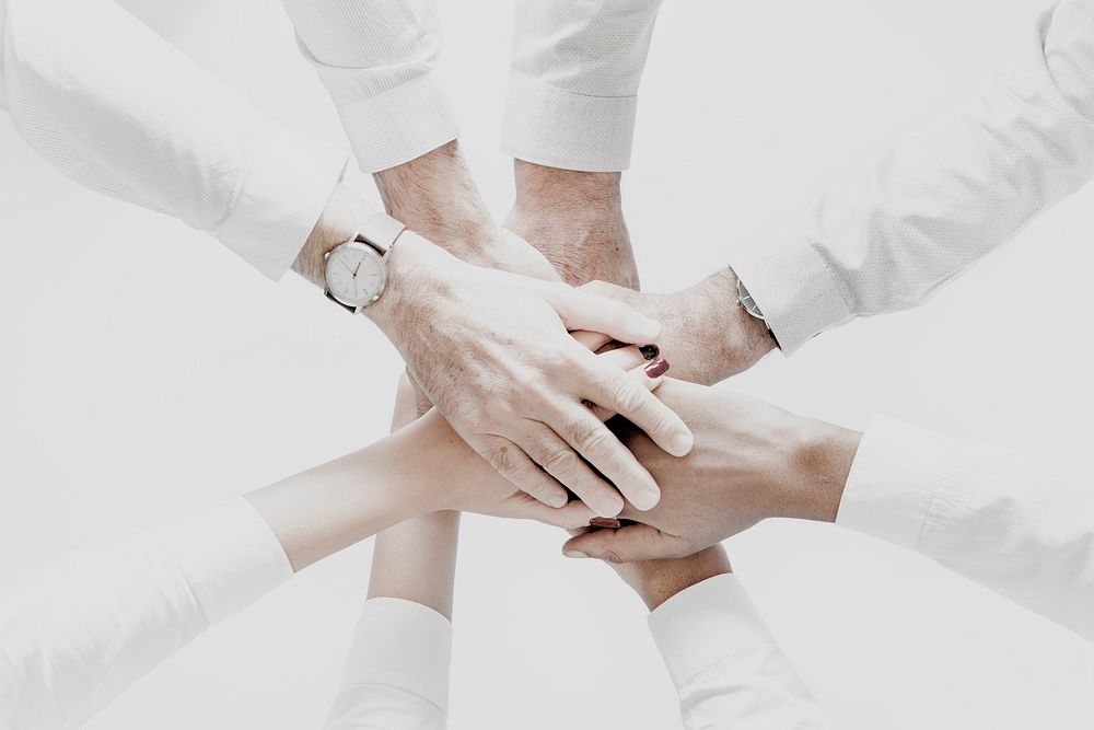 Business hands joined together as teamwork