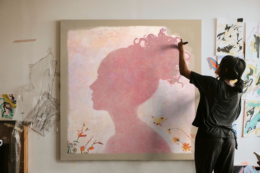 Canvas mockup with woman artist painting psd 