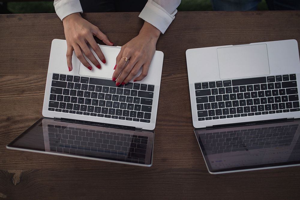 Hands With Laptop. View public domain image source here