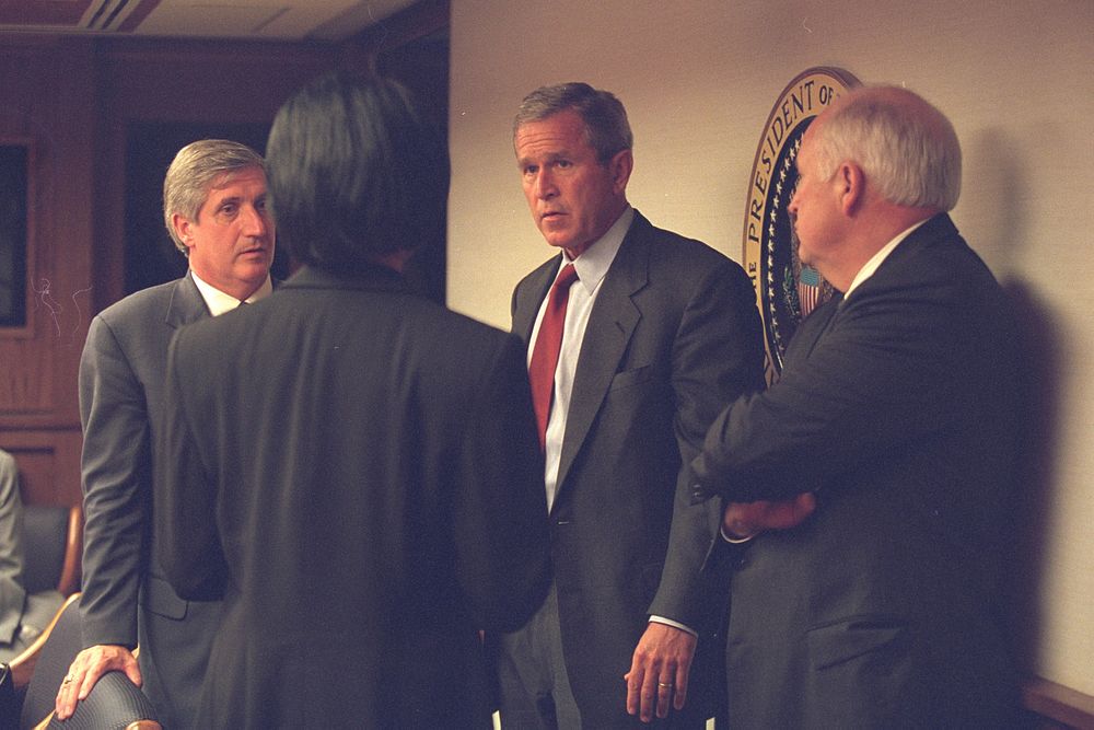 President Bush with Vice President Cheney and Senior Staff in the President's Emergency Operations Center (PEOC). Original…