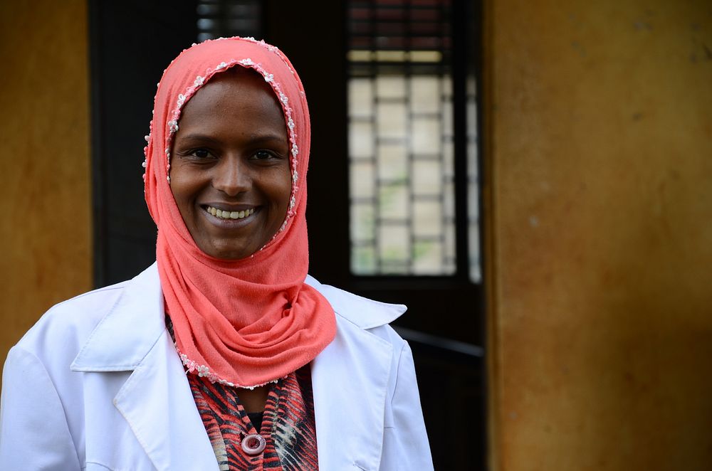 Ethiopian health worker outside health facility