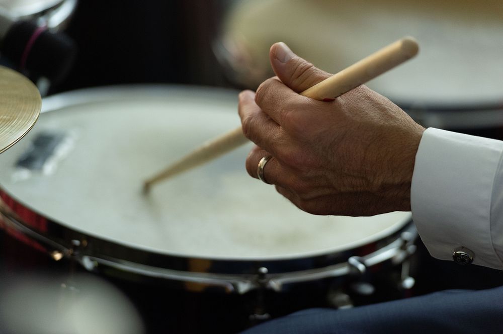 Drum close up, drummer performing. Original public domain image from Flickr