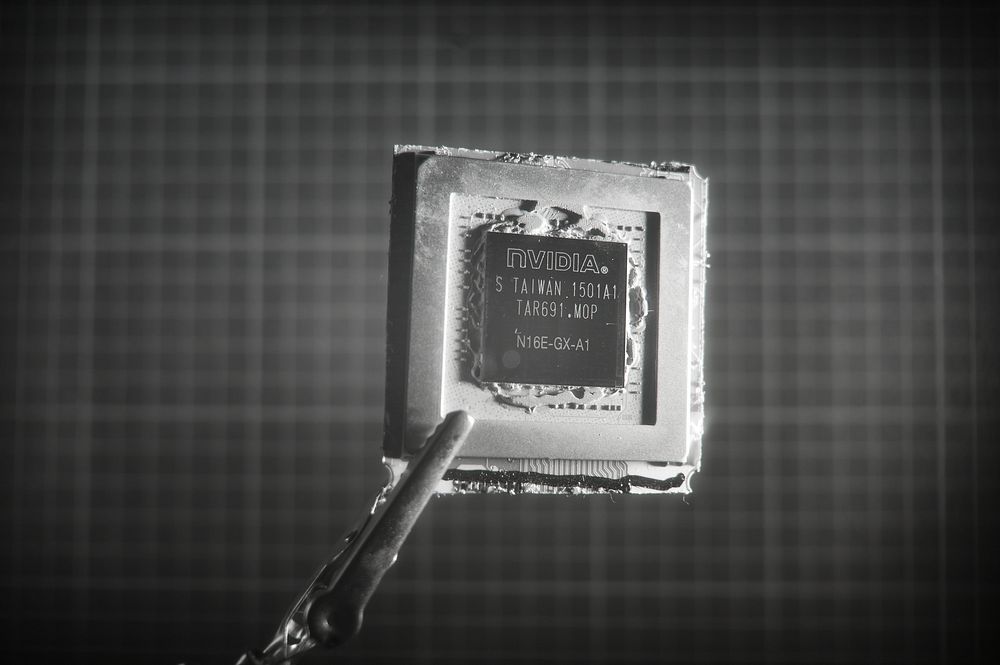 Testing with infrared, polysilicon layer is visible, the chip is still on the package.