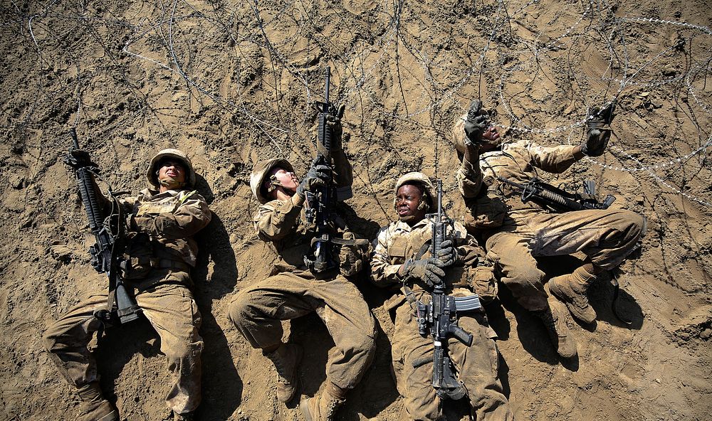 U.S. Marine Corps recruits with November Company, 4th Recruit Training Battalion, complete obstacles during the Crucible at…