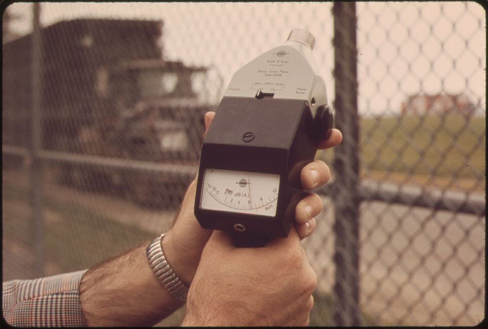 Noise Meter, Held at Logan Airport End of Neptune Road Records Over 86 Decibels. Original public domain image from Flickr