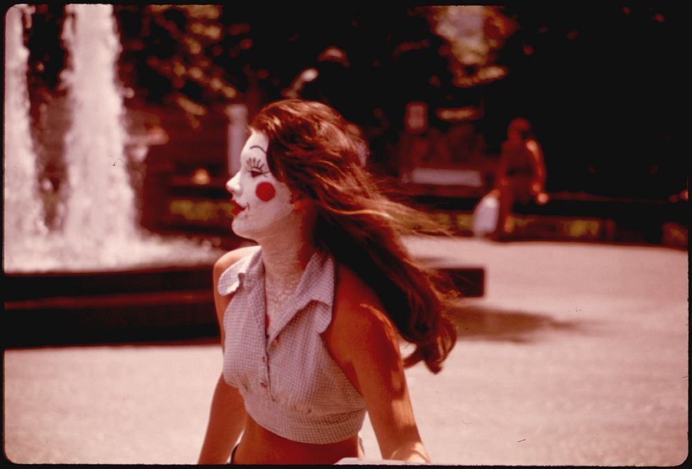 Girl Made Up for a Sorority Initiation Crosses Fountain Square 06/1973. Photographer: Hubbard, Tom. Original public domain…
