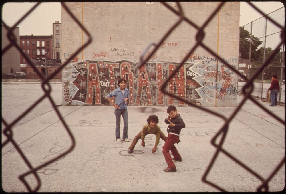 Three Boys and "A Train" Graffiti in Brooklyn's Lynch Park in New York City. The Inner City Today Is an Absolute…
