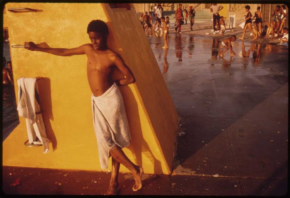 Boy Against a Yellow Platform at the Kosciusko Swimming Pool in the Bedford-Stuyvesant District of Brooklyn in New York…