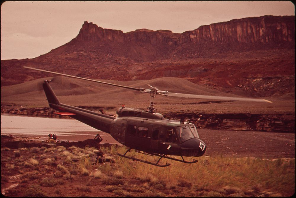 A Helicopter at Log Boom in Monument Valley Utah, 10/1972. Original public domain image from Flickr