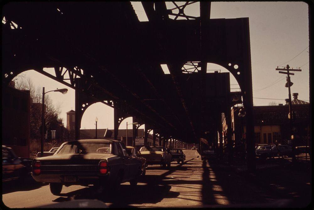 Elevated Railroad Structure and Blighted Area below Washington Street South from the Corner of Bartlett. Original public…