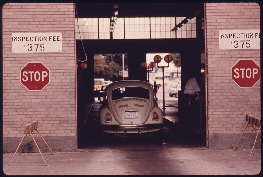 Car Has Just Entered the Safety Lane at an Auto Emission Inspection Station in Downtown Cincinnati, Ohio 09/1975.…