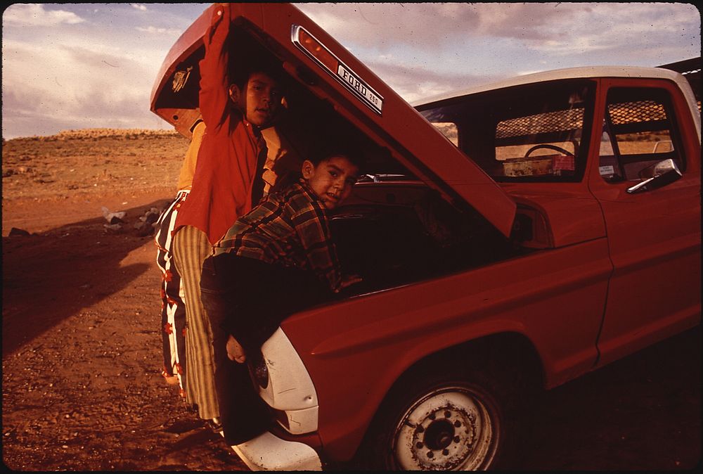 Navajo Children Examine Their Family Pick-Up Truck. Photographer: Eiler, Terry. Original public domain image from Flickr