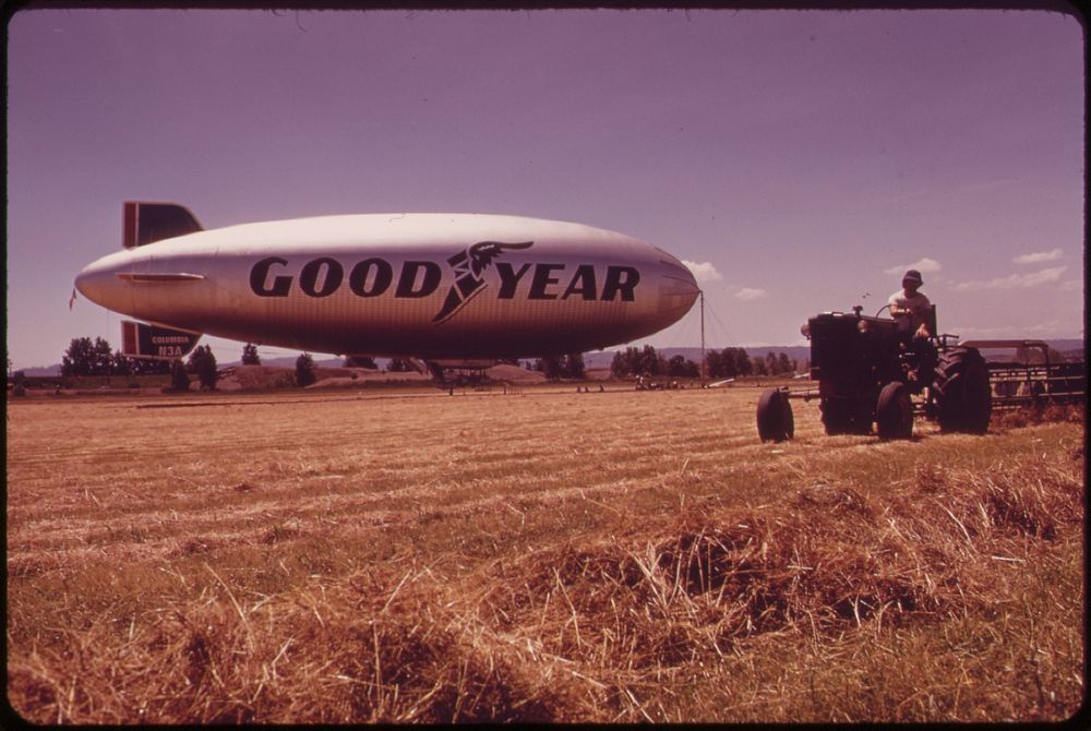 Threshing at the Pierson Park Airfield, Goodyear Blimp in Background 06/1973. Photographer: Falconer, David. Original public…