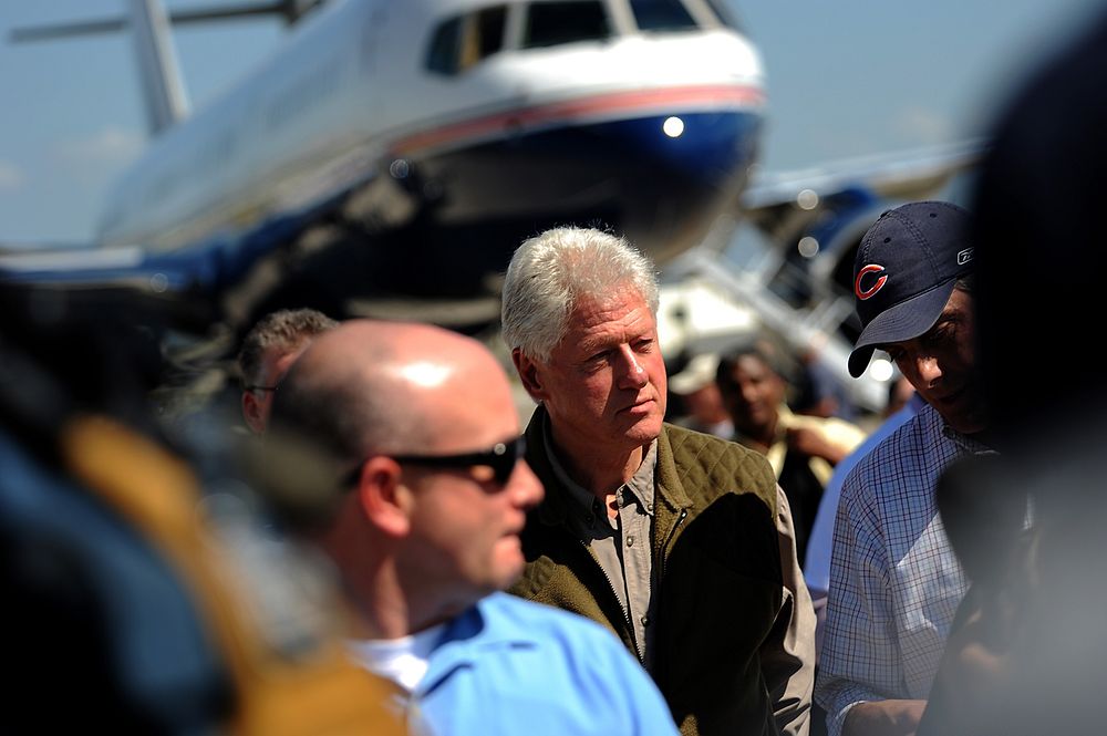 Former President Bill Clinton and his daughter, Chelsea, visit Port au Prince, Haiti, Jan. 18, 2010.