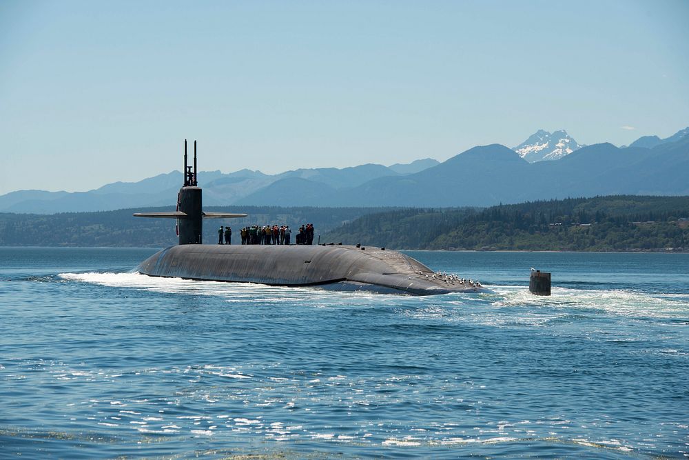 The Ohio-class ballistic missile submarine USS Nebraska (SSBN 739) transits the Hood Canal as it returns home Naval Base…