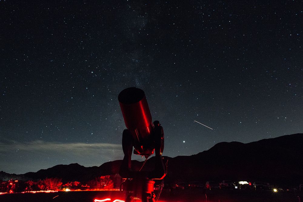 Stargazers under a starry sky