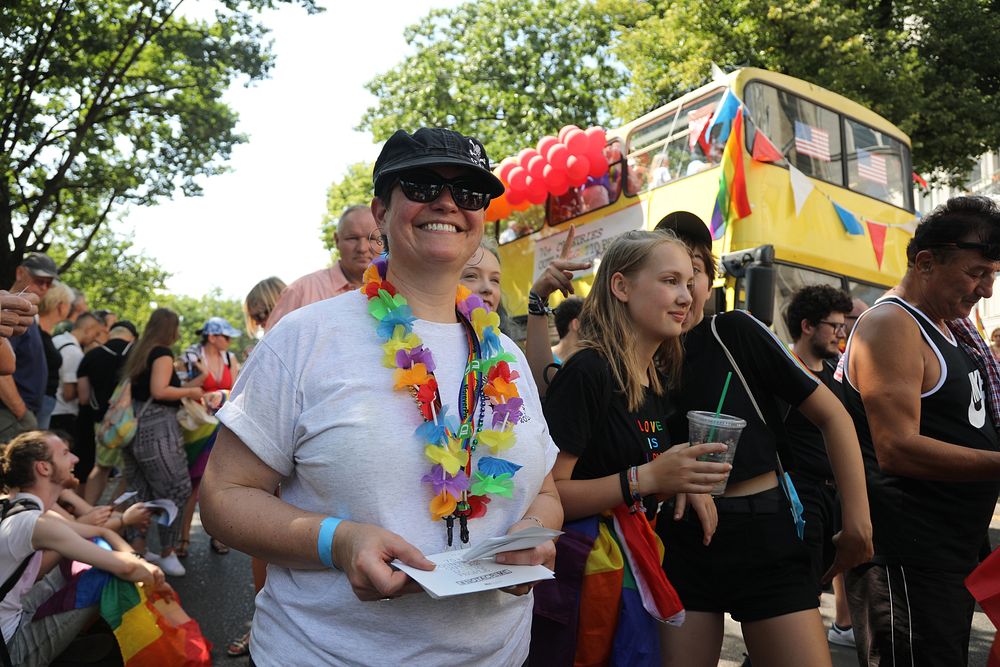 Pride parade, happy people. Original public domain image from Flickr