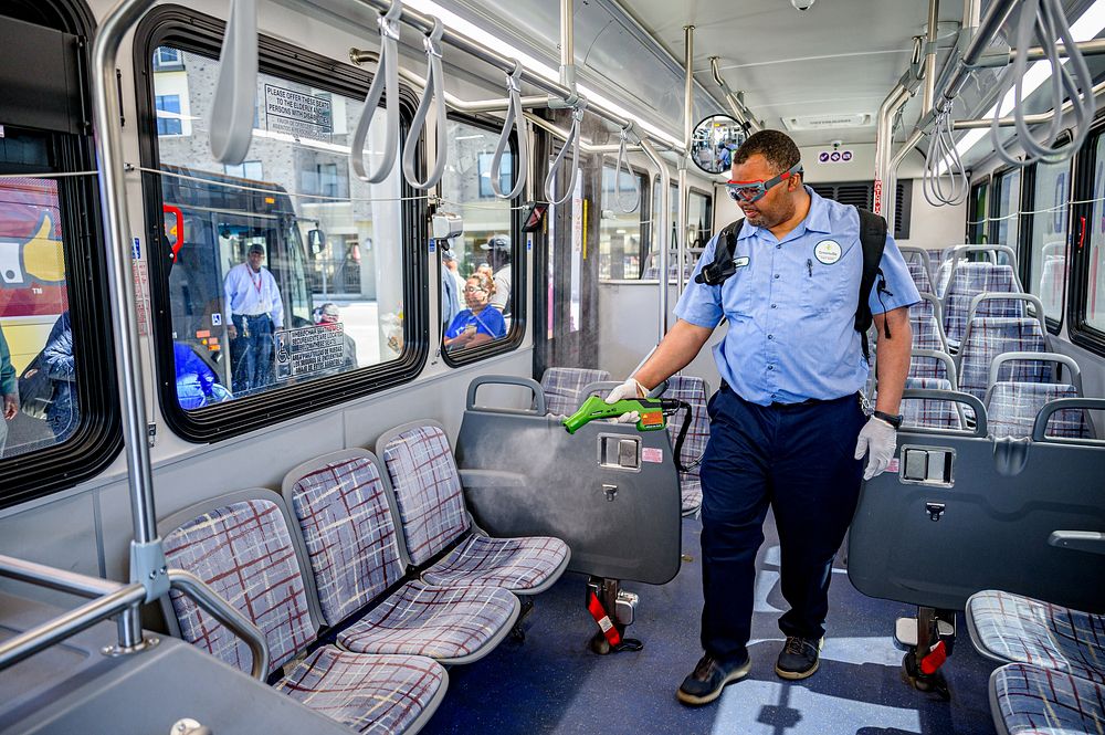 City staff spray disinfectant on all surfaces in City busses after completing morning routes on Monday, March 16, 2020.…