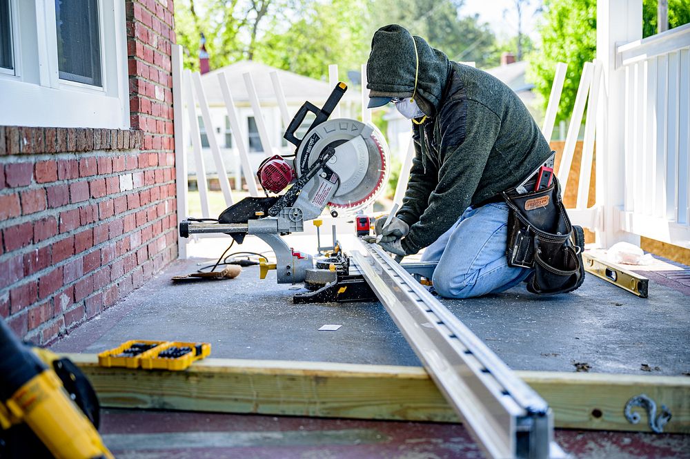 Finishing touches are applied to the exterior of a home undergoing rehabilitation through the City of Greenville's Housing…