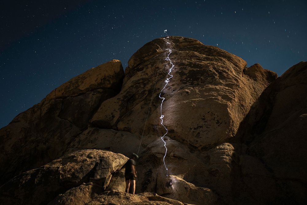 Night climbing headlamp trails