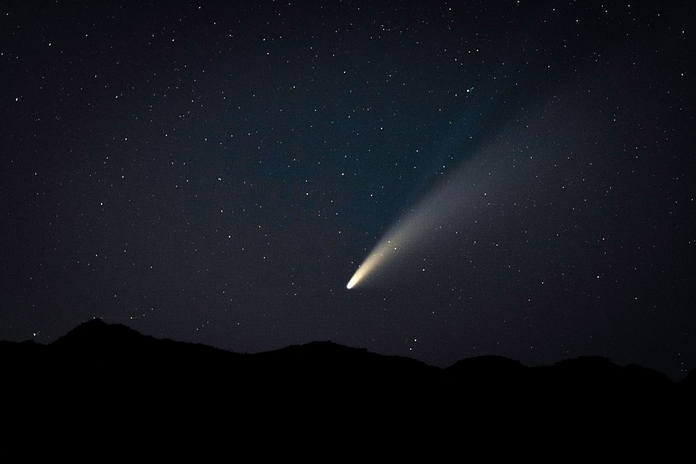 Comet in dark sky
