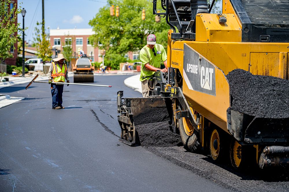 Town Creek CulvertConstruction crews lay down new layers of asphalt along Reade Circle as the work near the Evans Street…