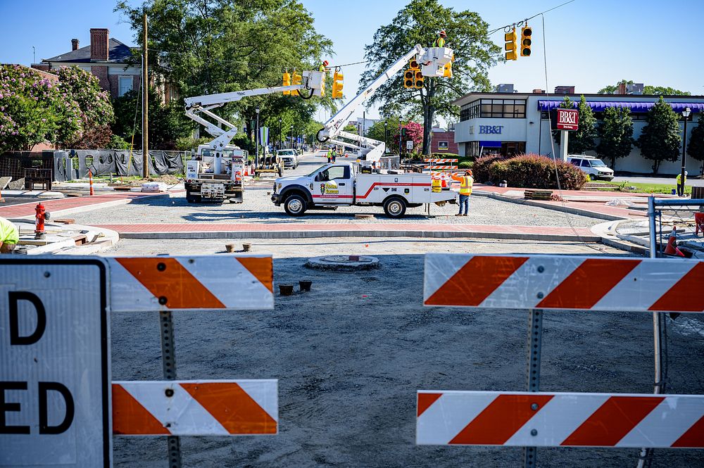 Temporary traffic and pedestrian signals are installed at Evans Street while trees are planted along Reade Circle, July 14…