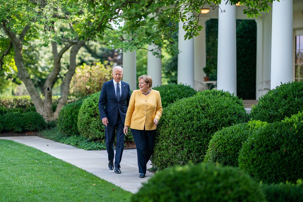 President Joe Biden and German Chancellor Angela Merkel walk through the Rose Garden of the White House on Thursday, July…