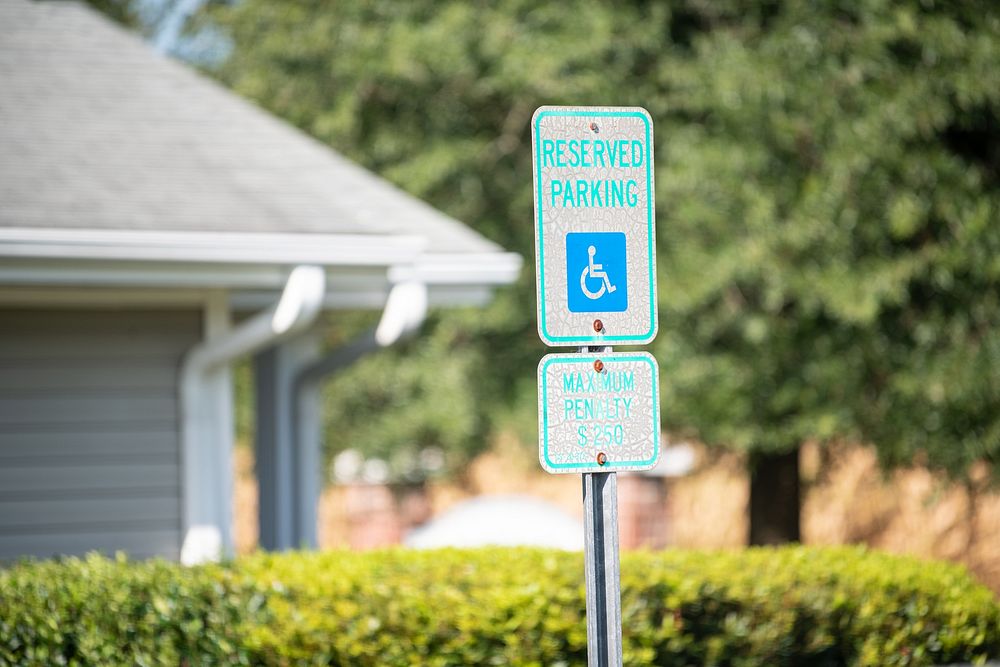 Reserved parking and penality sign. Original public domain image from Flickr