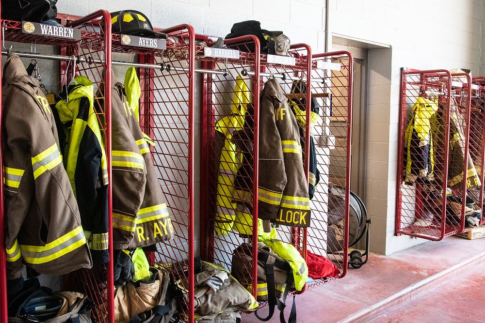 Fire department bunker gear racks. Original public domain image from Flickr