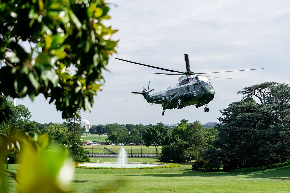Marine One, carrying President Joe Bident, prepares to land on the South Lawn of the White House Lawn. Original public…