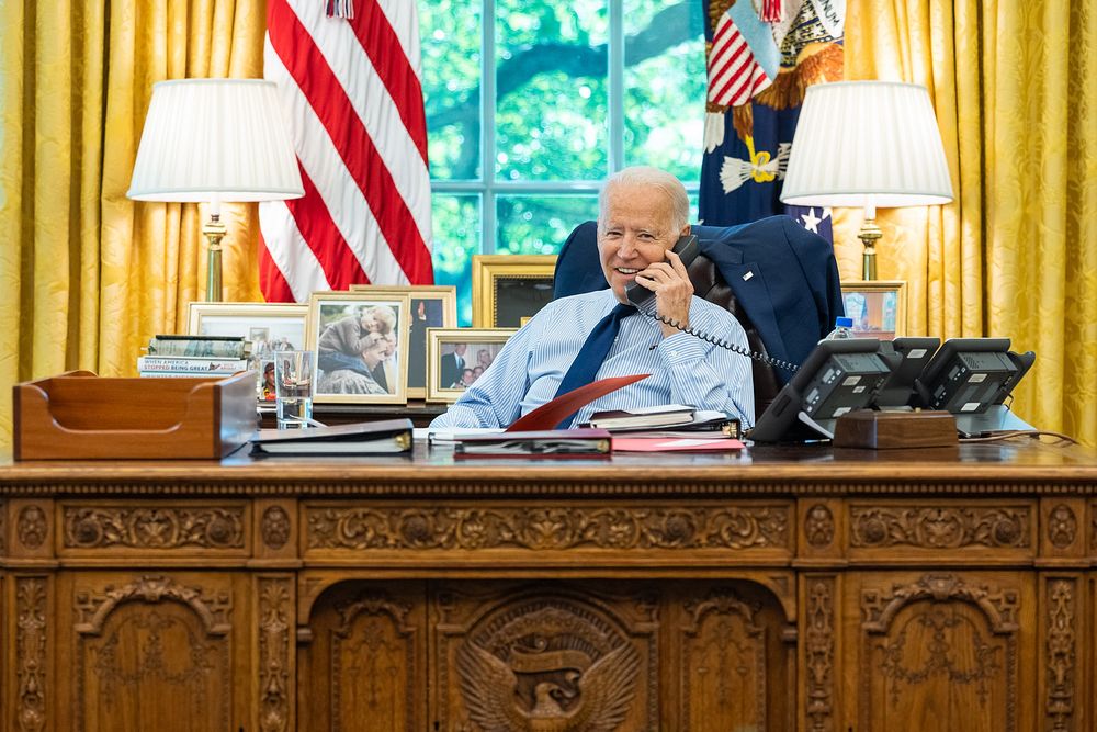 President Joe Biden talks on the phone with U.S. Sen. Angus King, I-Maine, during congressional call time on Friday, July…