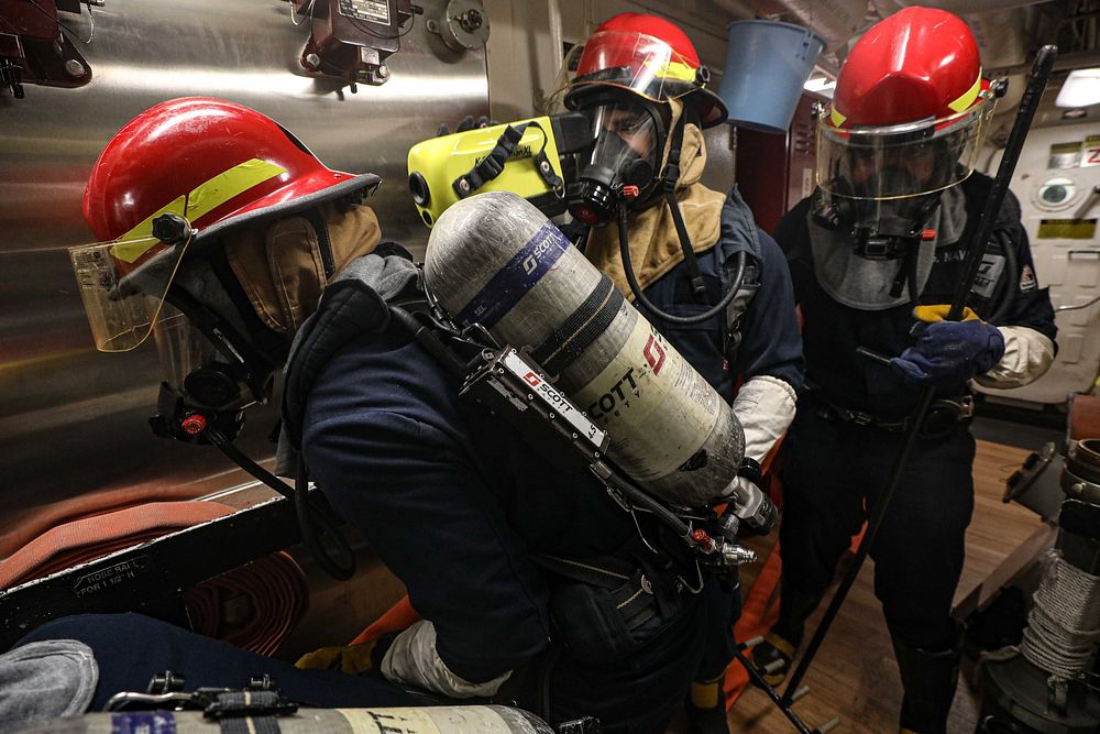 Sailors assigned to the Arleigh Burke-class guided-missile destroyer USS Porter (DDG 78) conduct General Quarters operations…