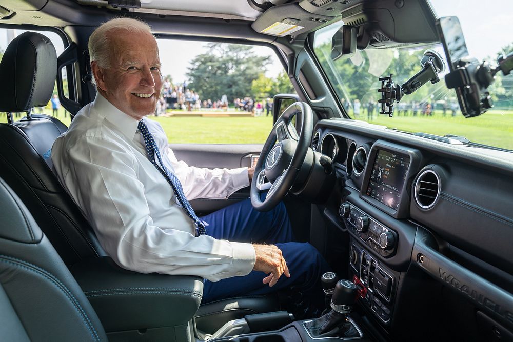 President Joe Biden drives a Jeep Wrangler Rubicon during a clean cars event, Thursday, August 5, 2021. (Official White…