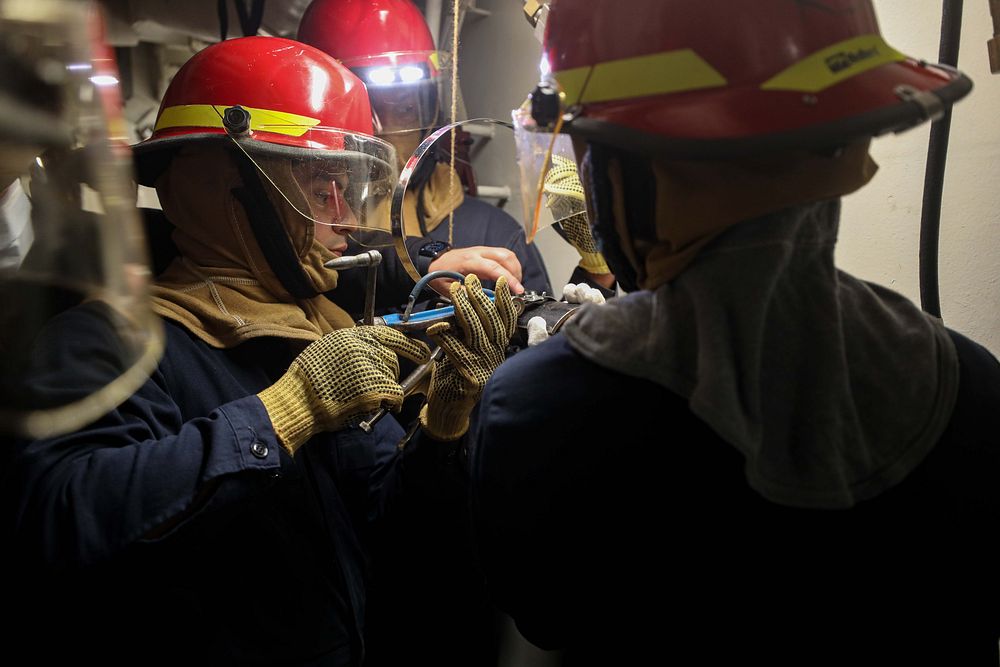 Sailors aboard the Arleigh Burke-class guided-missile destroyer USS Porter (DDG 78 respond to a casualty during a General…