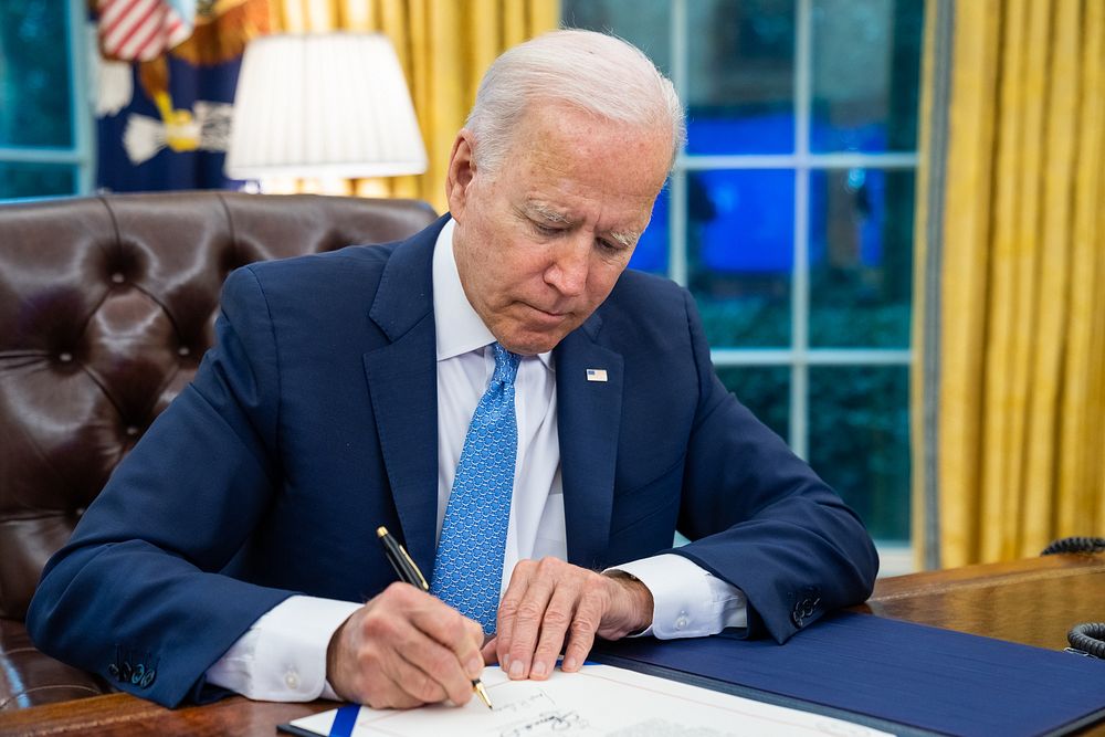 President Joe Biden signs the Emergency Reparation Assistance for Returning Americans Act, Tuesday, August 31, 2021.…